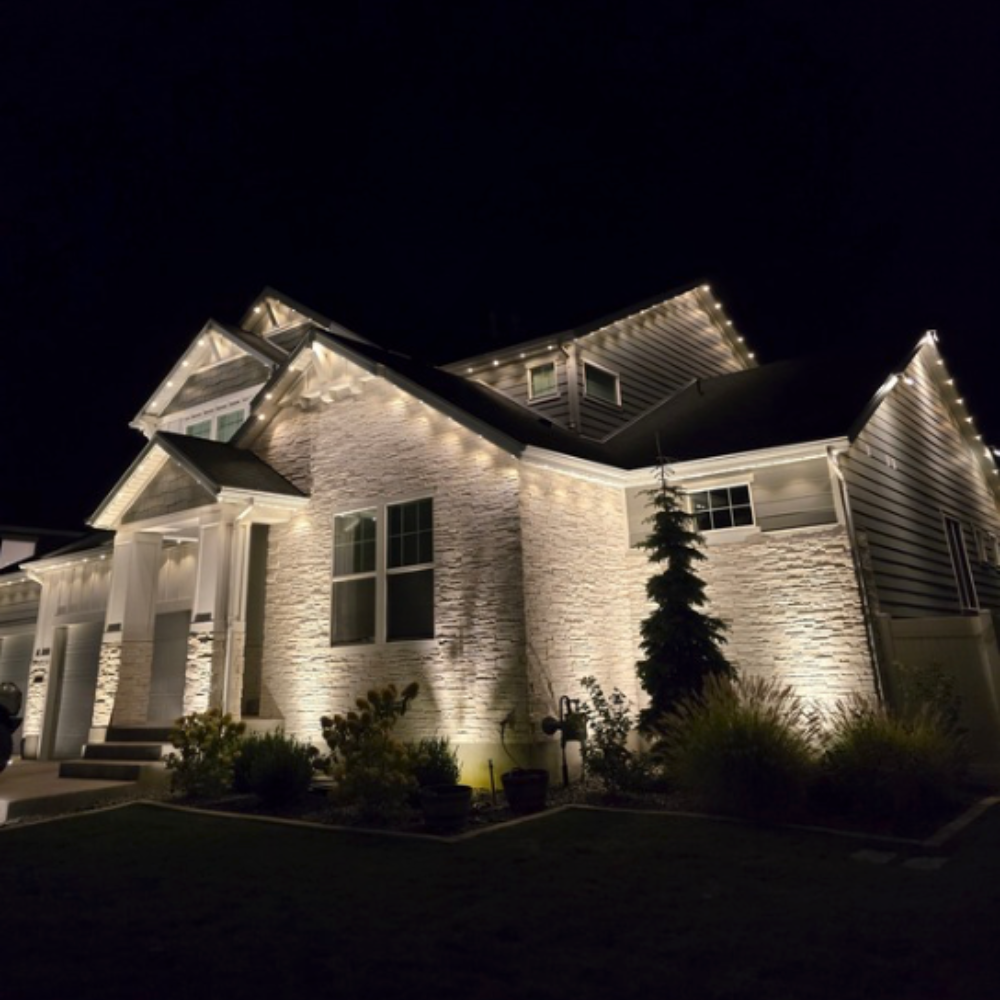 Warm white permanent Christmas lights on luxury Texas home